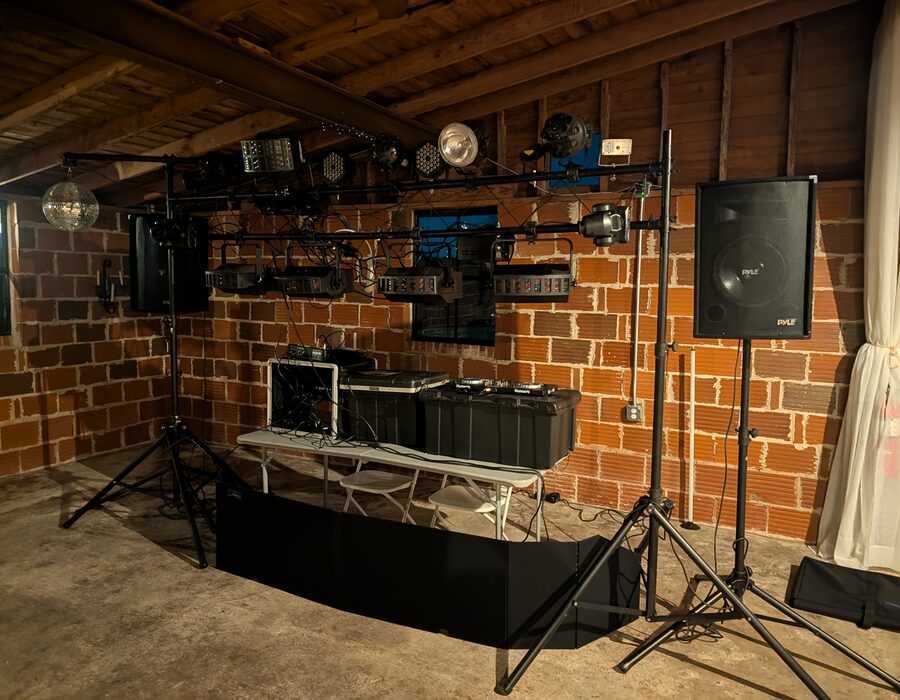 Full DJ light truss, speakers, and booth
